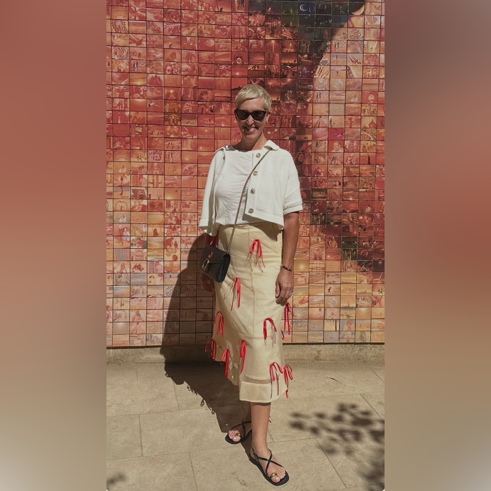 Anthropologie Maeve cream midi skirt with red bows